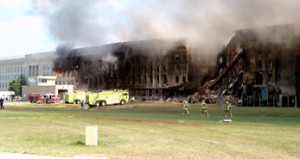 Firefighters_struggle_to_contain_the_fire,_after_the_September_11,_2001,_terrorist_attack_on_the_Pentagon_010911-F-XT317-003