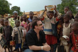 Bono, hard at work making us feel better about ourselves